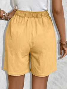 Women's bright yellow casual shorts with elastic waist and breathable cotton linen texture