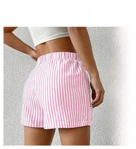 Détail du short décontracté ample à rayures verticales roses et blanches pour femmes