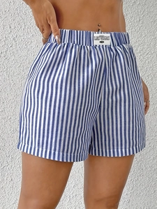 Women's blue and white striped summer shorts with elastic waist and woven patch
