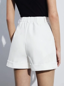 Women's high waist white shorts with elastic waistband and folded hem back view