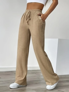 Women's high waist wide leg pants with pleated texture and drawstring waist design