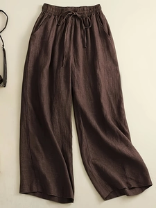Women's dark brown wide leg trousers with elastic waist and drawstring detail
