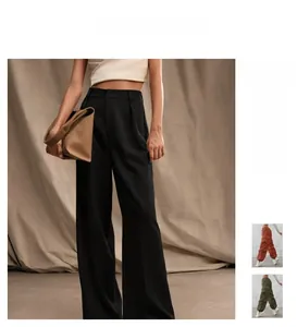 Detail of high-waisted wide-leg trousers in black, brick red, and army green colors