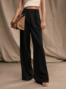 Professional high waist black wide leg trousers with elegant drape for office wear