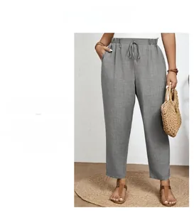 Detail of grey cotton linen high waist pants with elastic drawstring waist and loose fit
