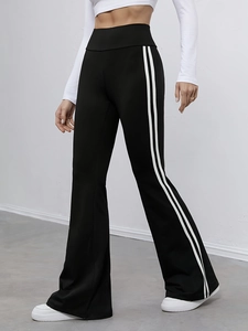 Pantalon de yoga évasé noir à taille haute avec doubles rayures latérales blanches
