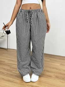 Women's plus size black and white gingham wide leg pants with drawstring elastic waist