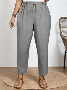 Plus size high waist grey cotton linen drawstring cropped trousers for women in a loose fit
