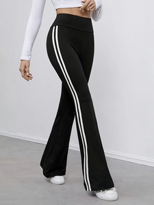 Pantalon de yoga évasé noir à taille haute avec rayures blanches latérales style tendance