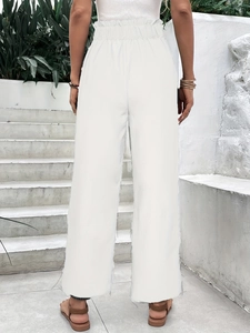 Women's white high-waist wide-leg pants with elastic waist and raw hem back view