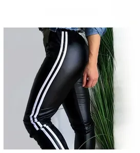 Detail of plus size high-waist faux leather pants with sporty side stripes in black