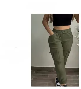 Detail view of high waist olive green cargo pants featuring elastic drawstring waist and side pockets