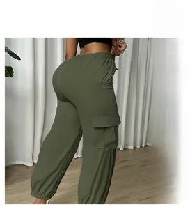 Detail of high waist olive green plus size cargo pants with large side flap pockets