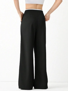 Women's high waist black wide leg trousers with a sleek straight cut and back detail