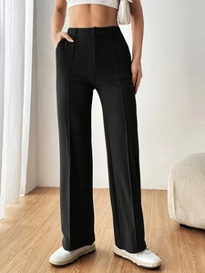 High-waist black wide-leg suit trousers for women with elegant front pleat and straight fit