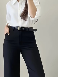 High waist pleated wide-leg dress pants with black leather belt and gold buckle