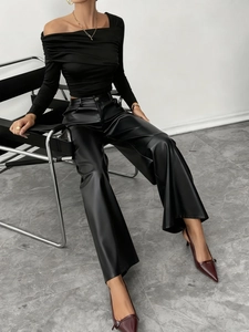 Pantalones de cuero PU negro de talle alto y pierna ancha para mujer con ajuste fluido