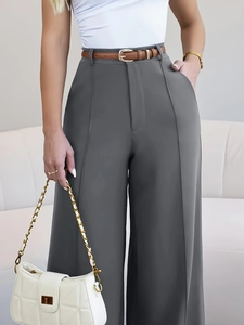 Women's high waist wide leg suit trousers in dark grey with elegant drape and thin belt