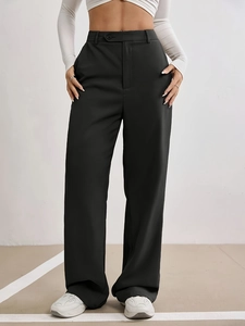 Women's high waist black wide leg suit trousers with elegant drape and loose straight cut