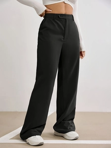 Women's high waist black wide leg dress pants with a loose fit and elegant drape