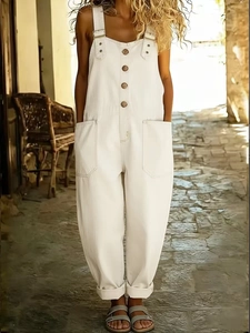 Retro white denim overalls for women featuring adjustable straps and front patch pockets