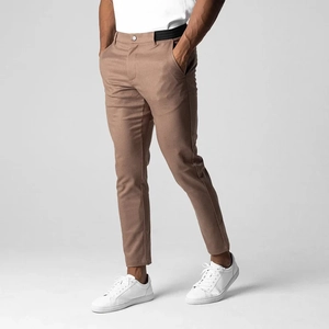 Detail shot of men's slim fit casual pants featuring unique black elastic side waistbands