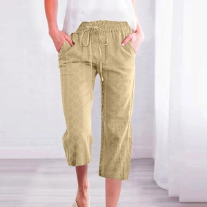 Detail view of khaki cotton linen culottes with drawstring waist and geometric texture