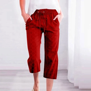 Detail of dark red drawstring cropped pants with elastic waist and geometric texture