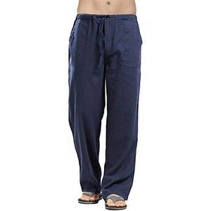 Dettaglio dei pantaloni blu navy in cotone e lino con vita elastica e coulisse regolabile