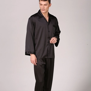 Men's black silk satin pajama set featuring long sleeve button-up shirt and matching pants