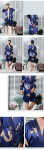Detail view of navy blue satin robe for men featuring golden dragon pattern and sash