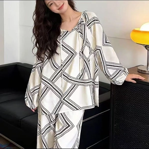 Women's long sleeve geometric print cotton lounge set with V-neck and relaxed pants