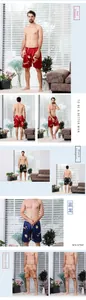 Detail view of men's silk pajama shorts featuring red, black, and blue dragon prints