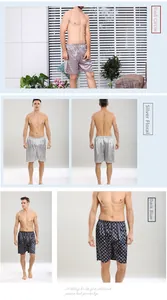 Detail of silk-like men's pajama shorts in red circle, silver floral and deep blue patterns