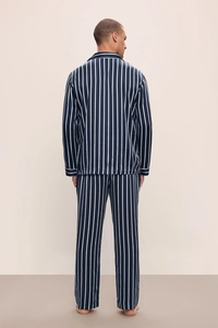 Rear view of men's dark blue striped pajamas set with silk-like finish and loose fit