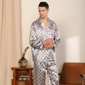 Luxury men's silk pajama set with geometric print and silver-grey long sleeve design