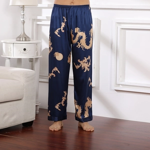 Men's navy silk pajama pants with traditional gold dragon prints and elastic waistband