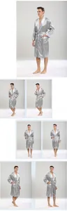 Detail view of men's silver silk satin bathrobe with geometric patterns and contrast collar
