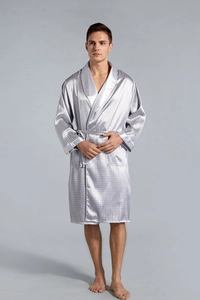 Close-up of silver-grey satin robe featuring fine geometric patterns and shawl collar