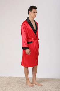 Detail of men's red silk satin robe with black contrast collar and cuffs in side view