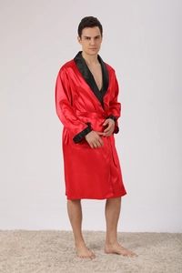 Detail of red silk bathrobe for men showing black lapel trim and waist belt tie closure