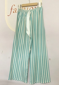 Detail of blue and white striped breathable pajama pants with elastic drawstring waist