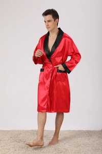 Detailed close-up of men's red silk satin bathrobe with black trim and matching waist belt