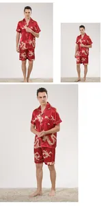 Red satin men's pajama set featuring short sleeves and gold dragon pattern print