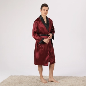 Detail of burgundy satin men's robe featuring black silk contrast trim and waist tie