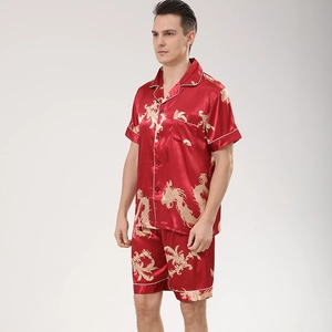 Men's silk satin pajama set with golden dragon print and short sleeves in vibrant red