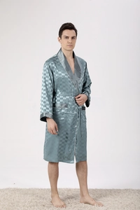 Detail of blue striped jacquard silk robe showing textured fabric and contrast piping