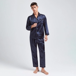 Men's navy blue silk satin pajama set with golden polka dots and long sleeves
