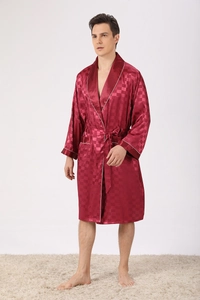 Detailed full-body shot of a burgundy silk satin robe with white piping and shawl collar