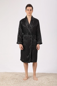 Detailed view of men's black satin robe featuring a checkered pattern and white piping